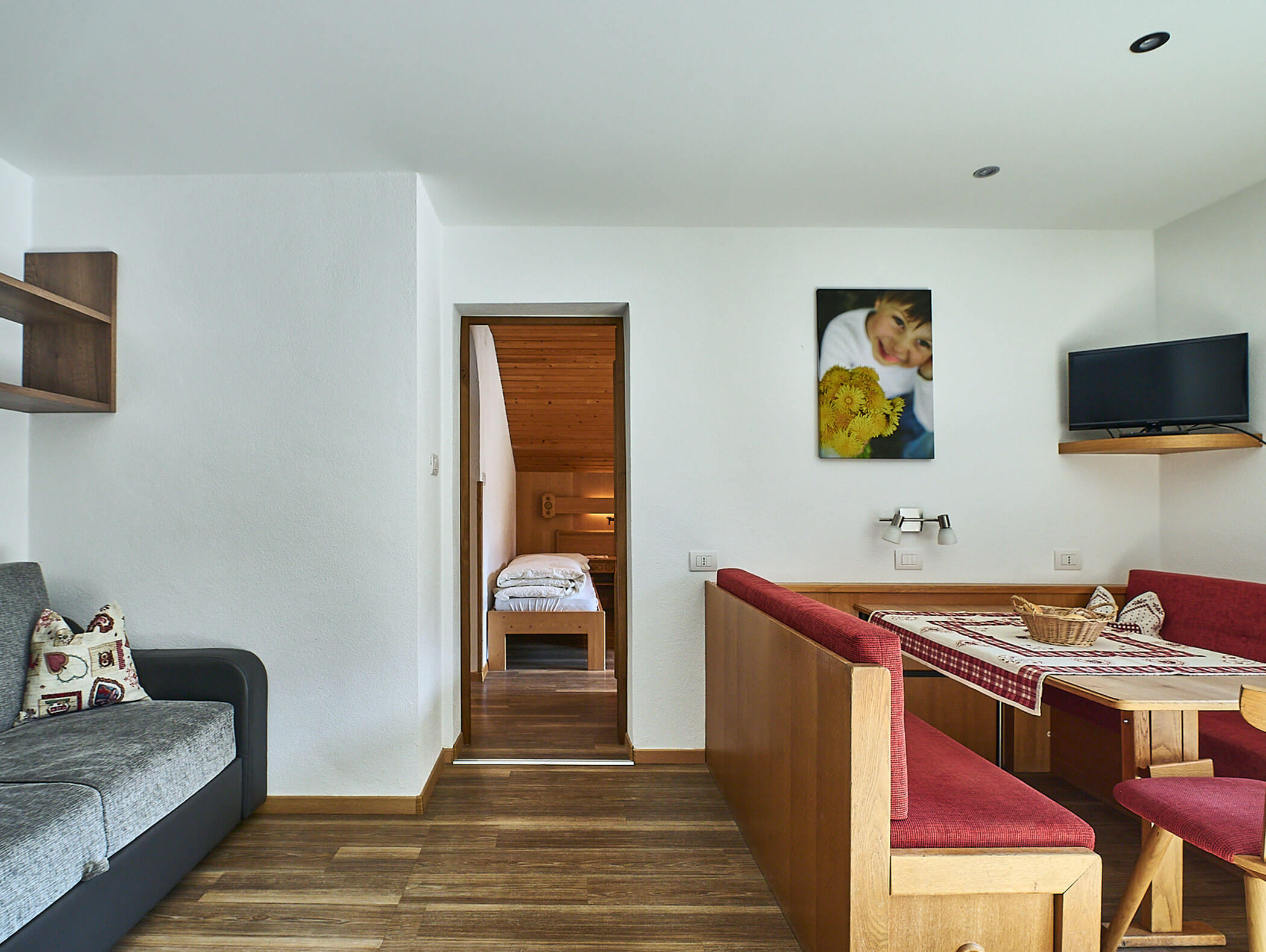 Blick ins Schlafzimmer im Apartment Gantkofel