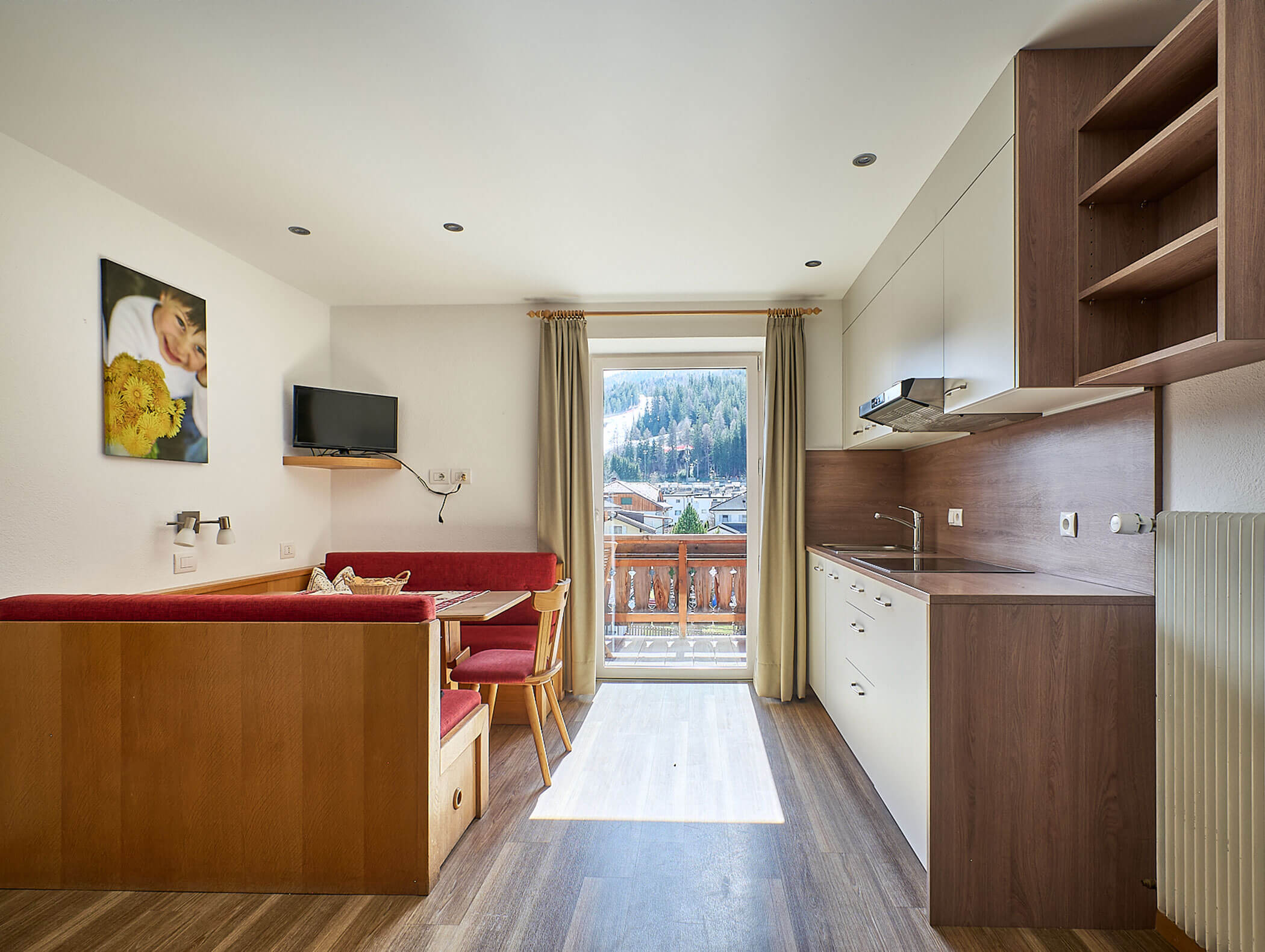 Ess- und Kochbereich im Apartment Gantkofel