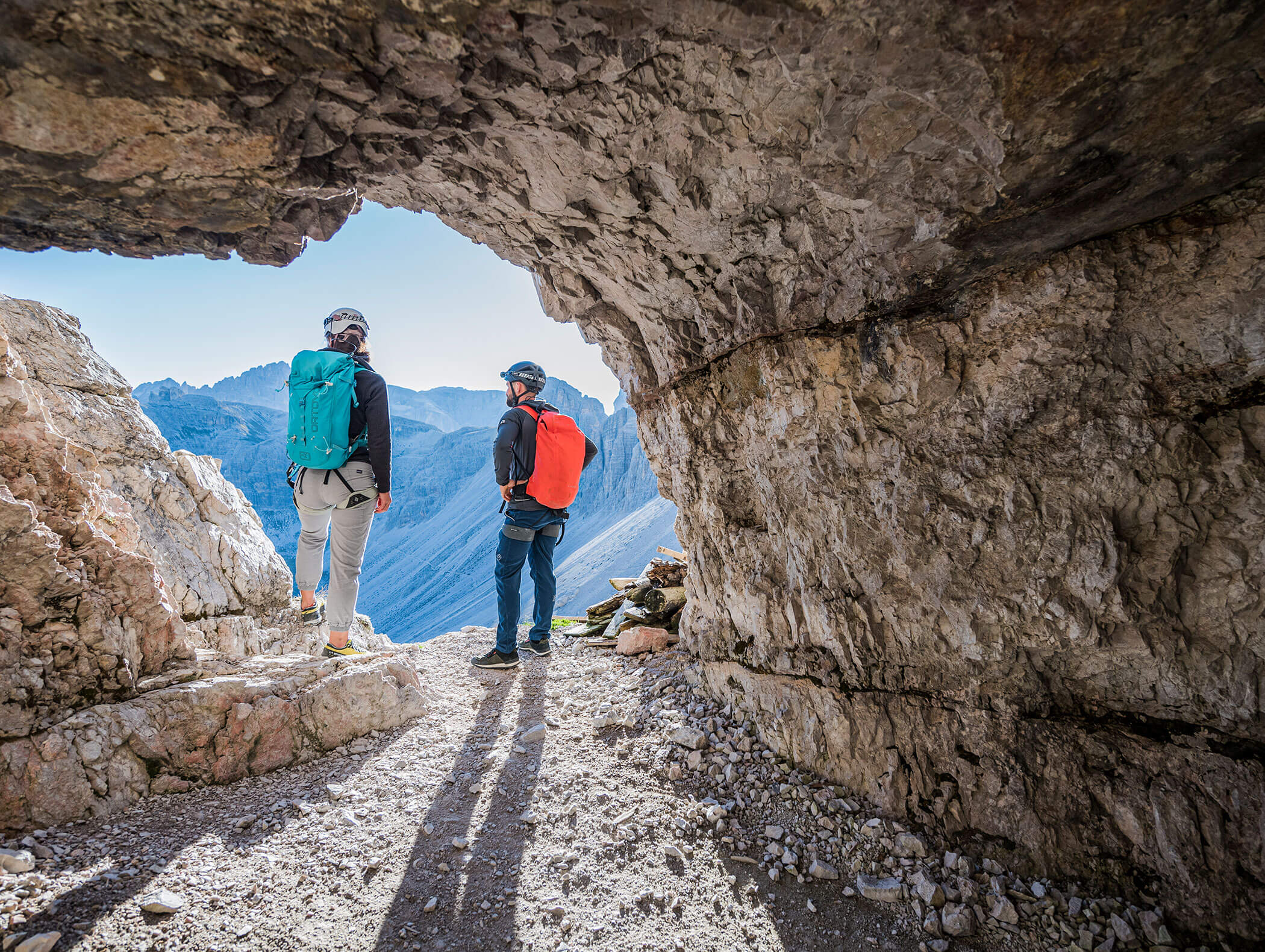 A couple admiring the panorama of the Dolomites