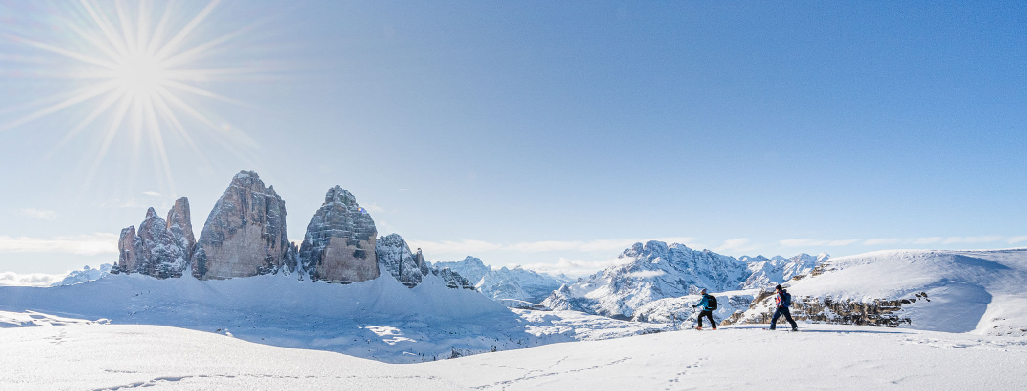 Two snowshoe hikers at the Three Peaks
