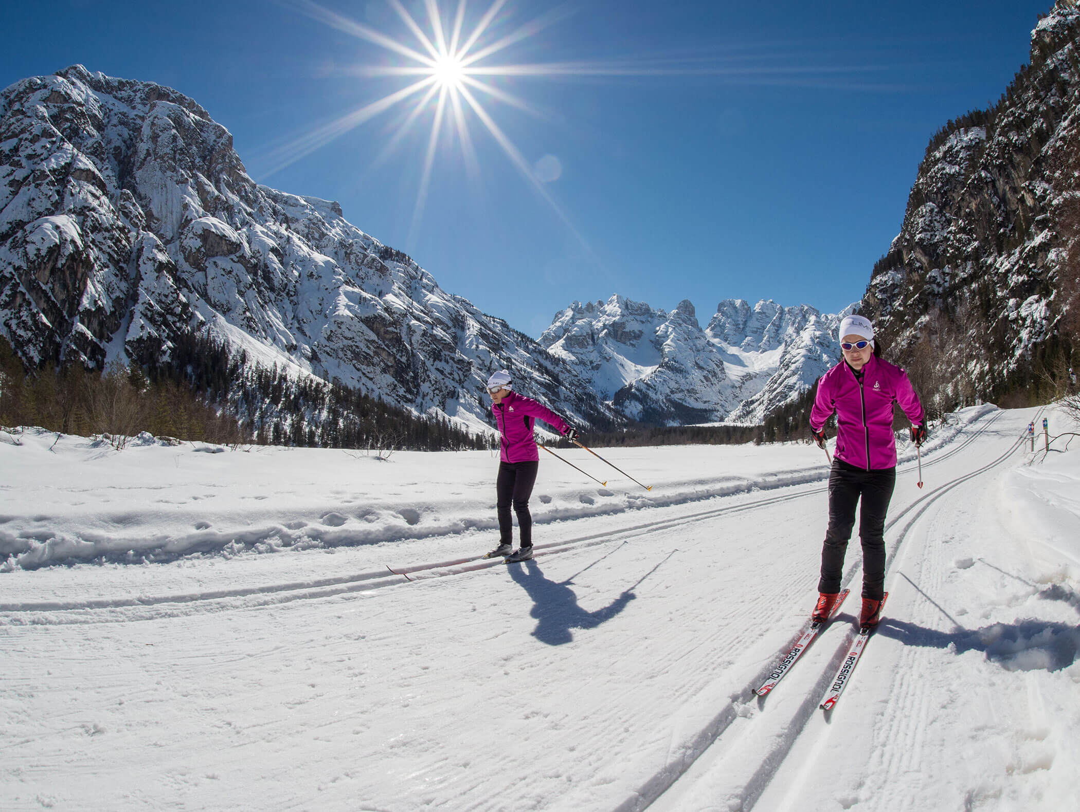 Two cross-country skiers on the trail